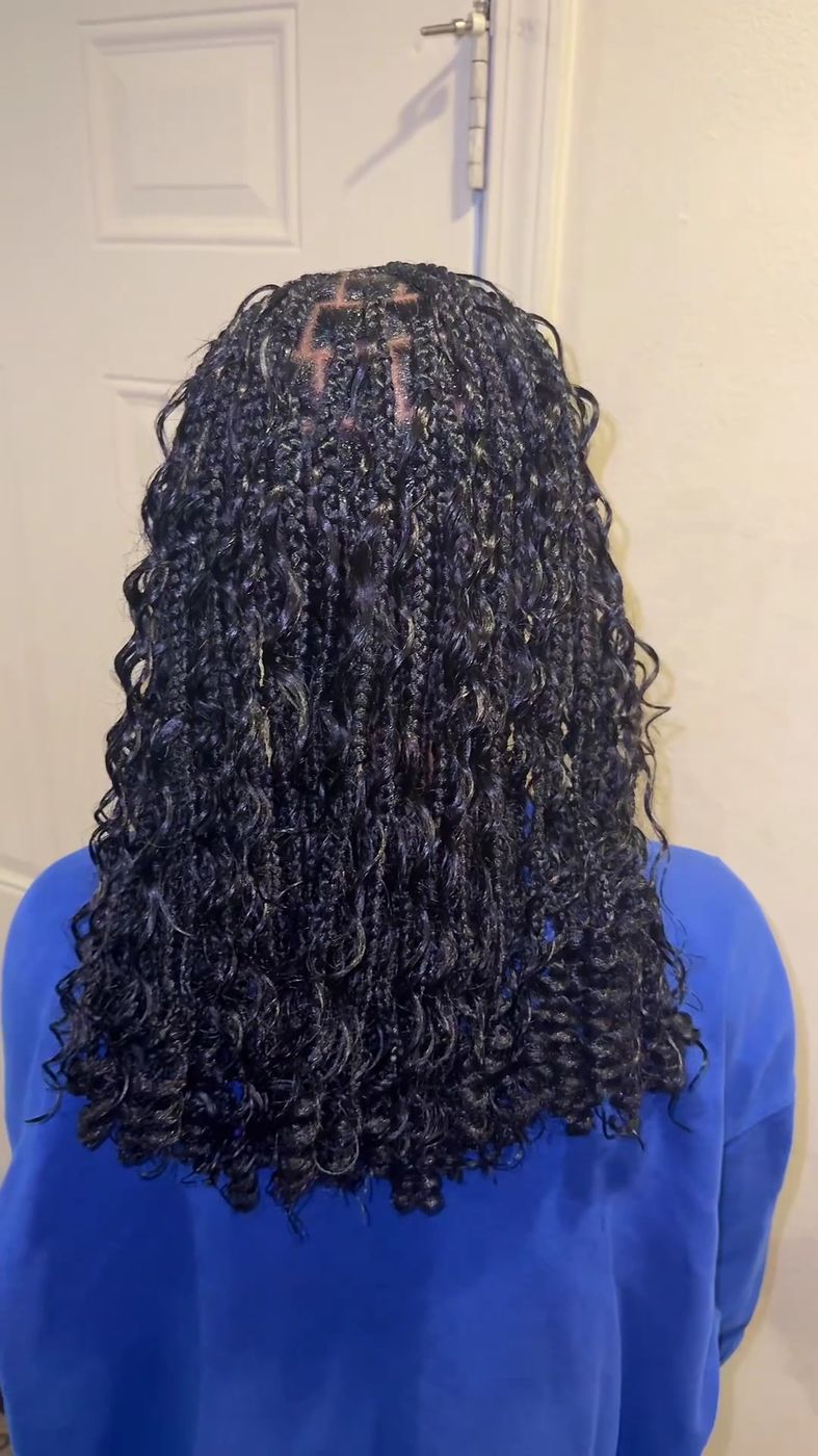 Boho box braids with loose curly ends