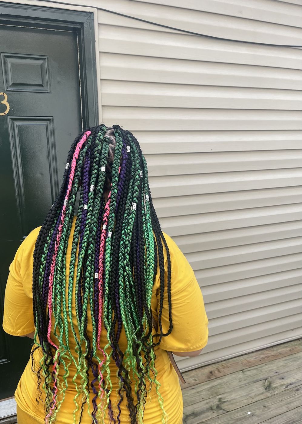 Green and purple braids with beads